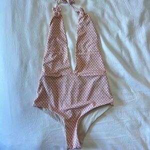 Tavik Emmes one piece